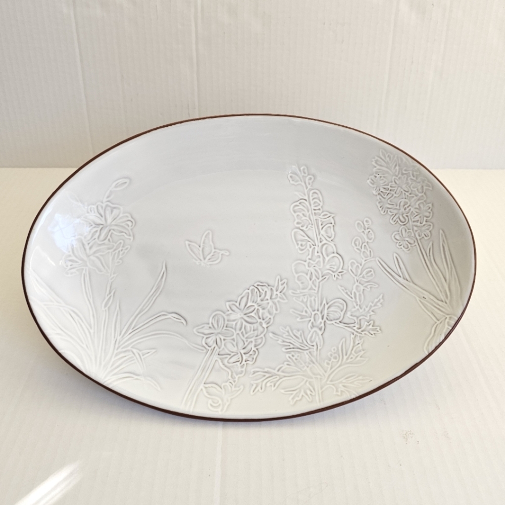 Pier 1 Terracotta oval platter off white glaze embossed floral pattern ceramic
